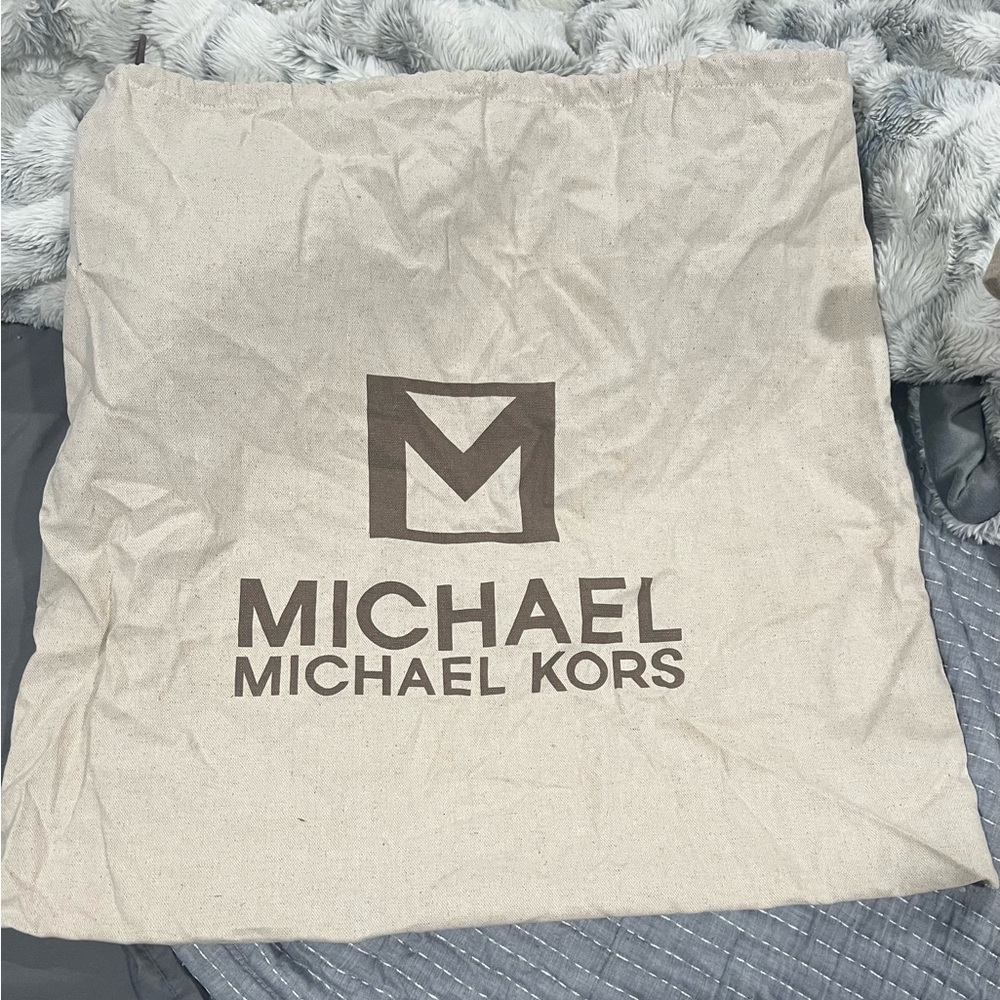 Michael Kors Tan Bag with Iconic Logo and Protective Design